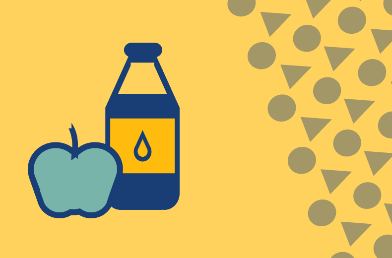 Apfel und Wasser vor gelbem Hintergrund